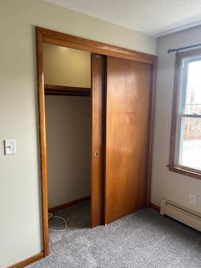 Hamburg apartment for rent - A room with a brown door and a window.