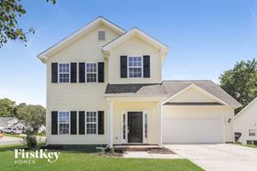 Charlotte house for rent - A two-story house with a garage is for sale by FirstKey Homes.