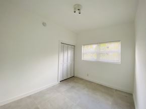 North Miami Beach apartment for rent - the living room of a home with white walls and a window
