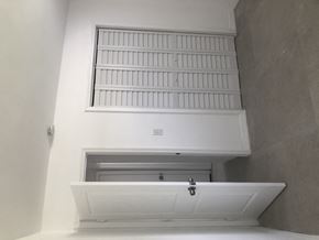 South Miami apartment for rent - a white bath tub sitting under a window in a room