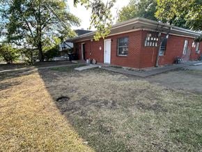 Killeen apartment for rent - A red brick house with a white door and windows.