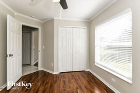 Davenport house for rent - the master bedroom has a large window and hardwood flooring