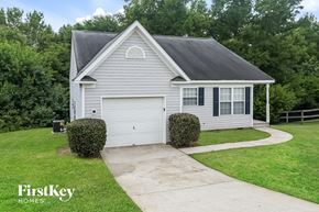 Monroe house for rent - A house with a garage and a driveway is for sale.
