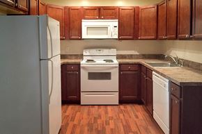 Clifton Park apartment for rent - a kitchen with a stove microwave and refrigerator