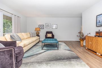 Ithaca apartment for rent - a living room with a couch and a chair