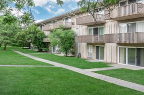 Ithaca apartment for rent - our apartments have a spacious courtyard with green grass and trees