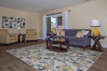 Ithaca apartment for rent - a living room with a couch and a table