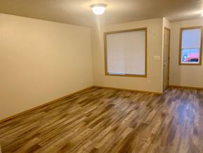 Kelso apartment for rent - A room with wooden flooring and a window with blinds.