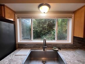 Kelso house for rent - a kitchen with a sink and a window