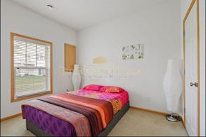 Plymouth house for rent - a bedroom with a bed and a window