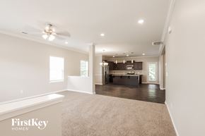 Charlotte house for rent - a spacious living room and kitchen in a new home