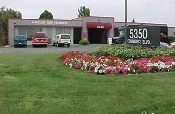 Rohnert Park apartment for rent - a flower garden in front of a car dealership