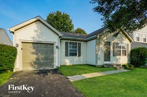 Grove City house for rent - A two-story house with a garage is for sale by FirstKey Homes.