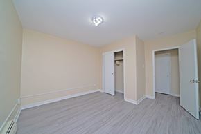 Winnipeg apartment for rent - A room with a light on the ceiling and a grey floor.