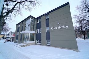 Winnipeg apartment for rent - a condominium building with the word credibility on the side of it