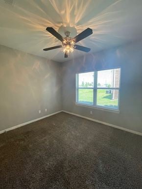 Kaufman apartment for rent - A room with a ceiling fan and a window.