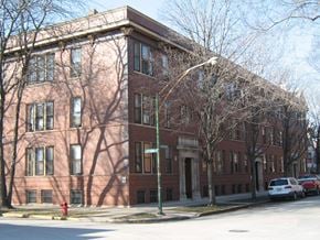 Chicago apartment for rent - a red brick building on the corner of a street