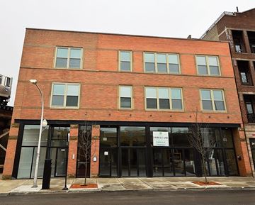 Chicago apartment for rent - a red brick building on the corner of a street