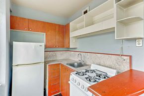 Jackson apartment for rent - a kitchen with a stove and a refrigerator