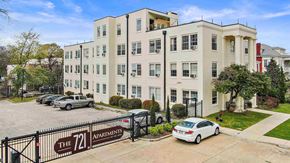 Jackson apartment for rent - an apartment building with cars parked in front of it