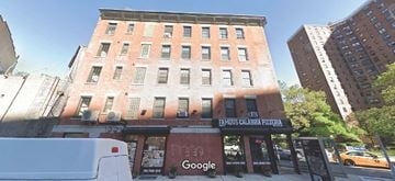 New York apartment for rent - A street view of a building with a Google store on the ground floor.