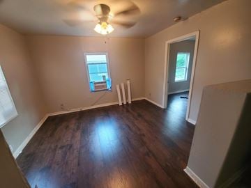 Killeen apartment for rent - A room with a ceiling fan and a window.