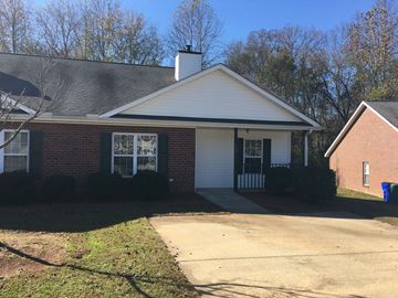 Nashville apartment for rent - A small house with a white roof and a chimney.