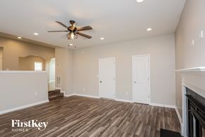 Pendergrass house for rent - a living room with wood flooring and a ceiling fan