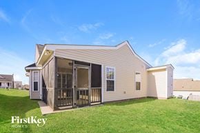 Knightdale house for rent - the preserve at bridgewater crossings back of house with porch and grass