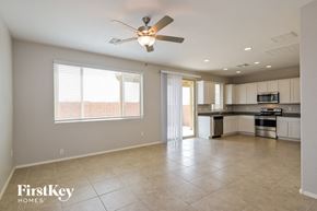 Vail house for rent - A spacious kitchen and living room with a FirstKey Homes logo.