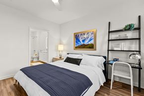 Phoenix apartment for rent - a bedroom with a bed and a desk and a bathroom