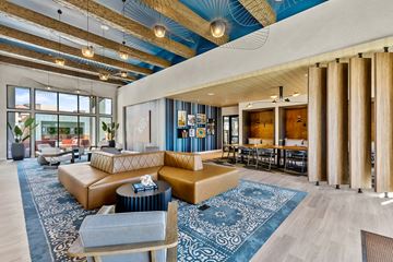 Phoenix apartment for rent - a living room with couches and chairs and a rug