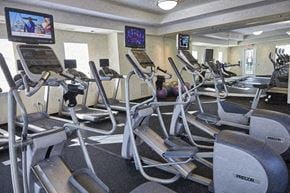 Madison Heights apartment for rent - A gym with treadmills and exercise equipment.