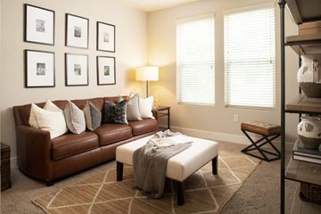 Omaha apartment for rent - a living room with a couch and a coffee table