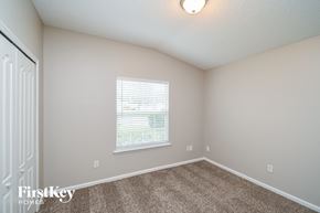 Jacksonville house for rent - a spacious bedroom with carpet and a window