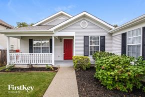 Antioch house for rent - A house with a red door and a white porch.