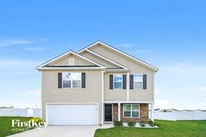 Lexington house for rent - a tan house with a white garage door