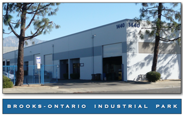 Orange apartment for rent - A large building with the number 1440 on it is the Brooks-Ontario Industrial Park.