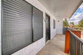 Scottsdale apartment for rent - two closets on the side of a building with doors