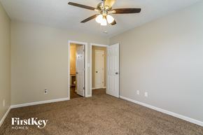 Holly Springs house for rent - the master bedroom is spacious and has a ceiling fan