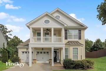 Charlotte house for rent - a white house with a porch and white doors
