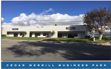 Orange apartment for rent - Cedar Merrill Business Park is a large, modern building with a parking lot in front.