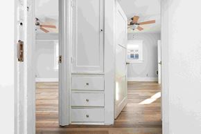 Long Beach apartment for rent - an empty room with a closet and a ceiling fan