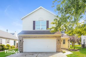Westfield house for rent - a white house with a white garage door