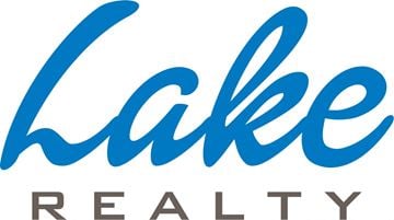 Hartville apartment for rent - Lake Realty logo with blue cursive font.