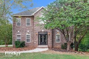 Clemmons house for rent - A brick house with a black front door and windows.