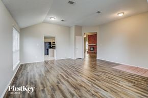Desoto house for rent - the living room and dining room are open to the kitchen and living room