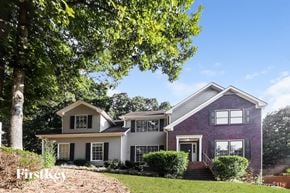 Lawrenceville house for rent - a house with a tree in front of it