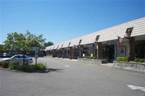 Jefferson Valley apartment for rent - a parking lot with a car parked in front of a building