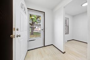 Brooklyn Center apartment for rent - an empty room with a white door and a window